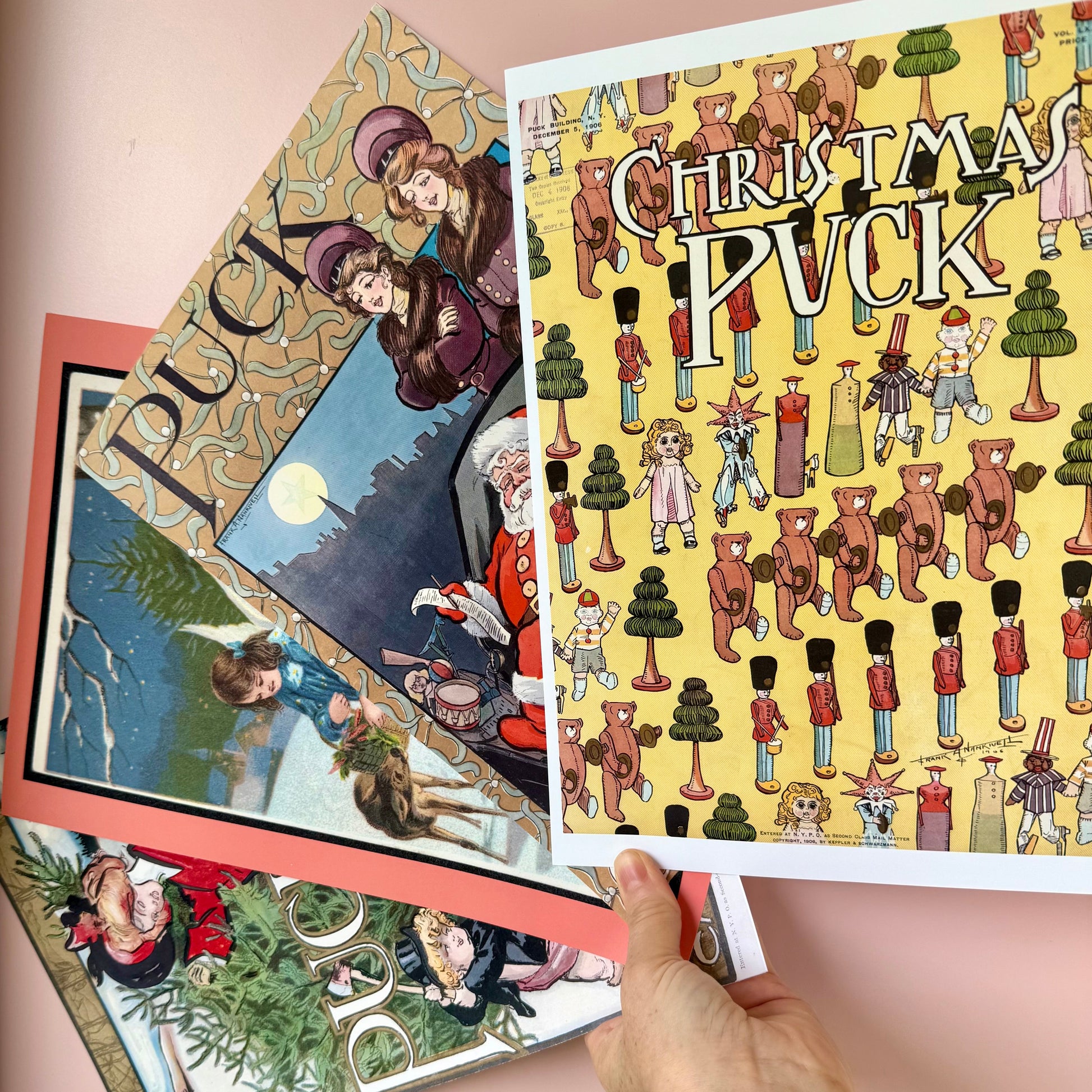 Collection of vintage-style Christmas cards with illustrations on a pink background