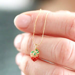 Load image into Gallery viewer, Tiny Strawberry Pendant Necklace in Gold
